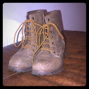 Brown lace up boots with plaid lining
